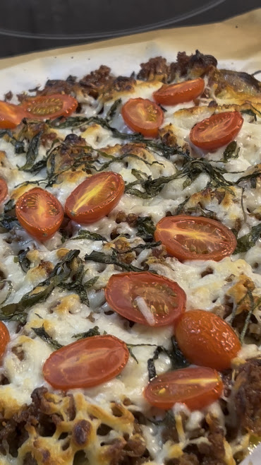 Layered potato-zucchini pizza bake with sausage and mozzarella
