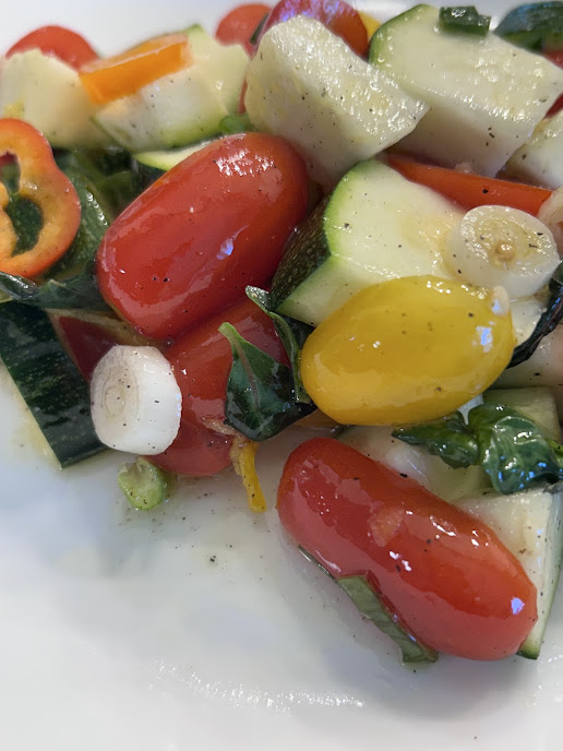 Zucchini basil salad with cherry tomatoes and peppers